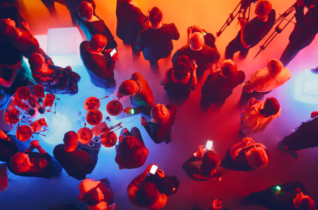 people group crowd enjoys at tables with food and 2026 01 06 09 02 13 utc - AesthetiCo